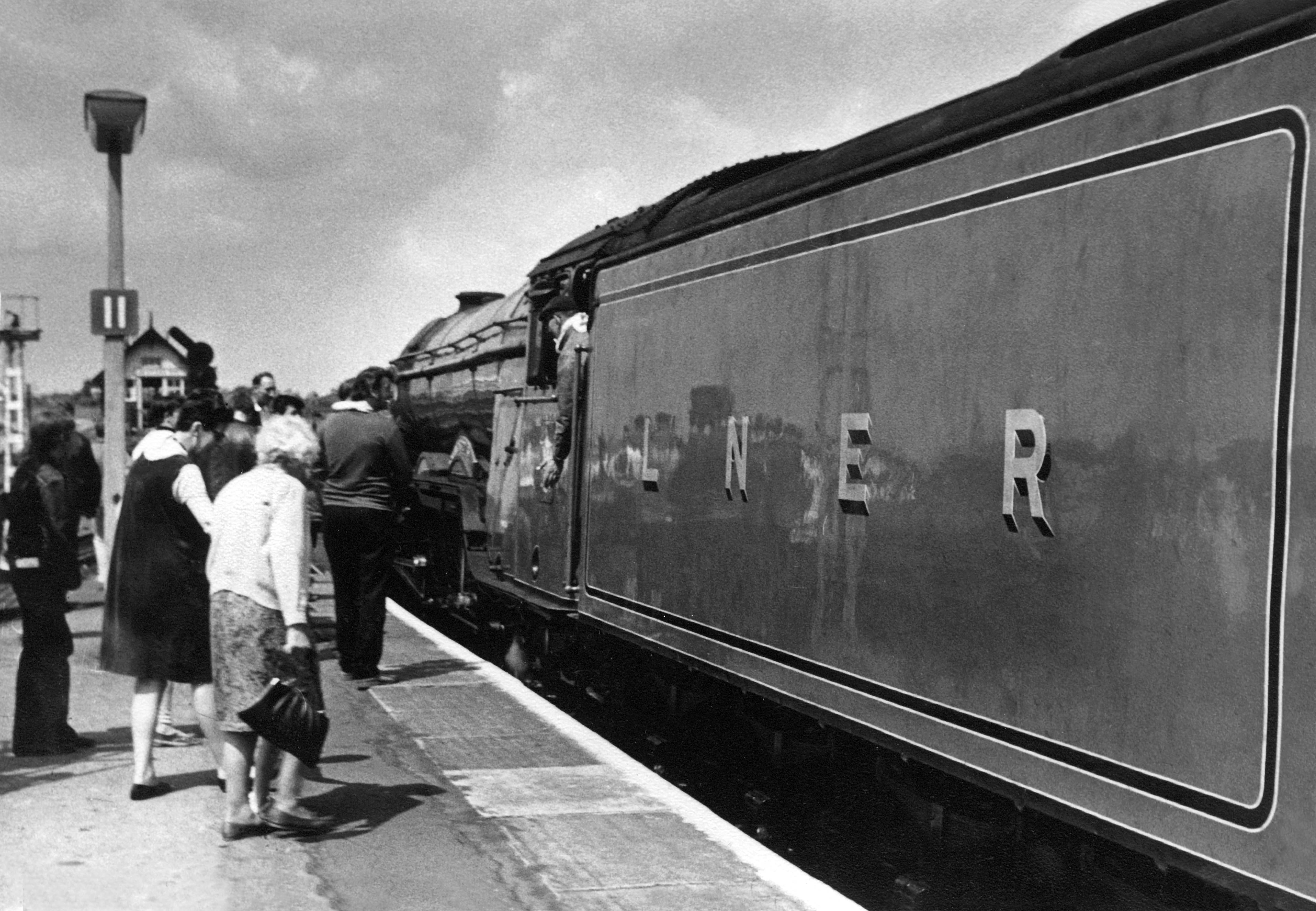 No.4472 'Flying Scotsman' calls at Grantham station. Photograph lent By Ken Willetts.