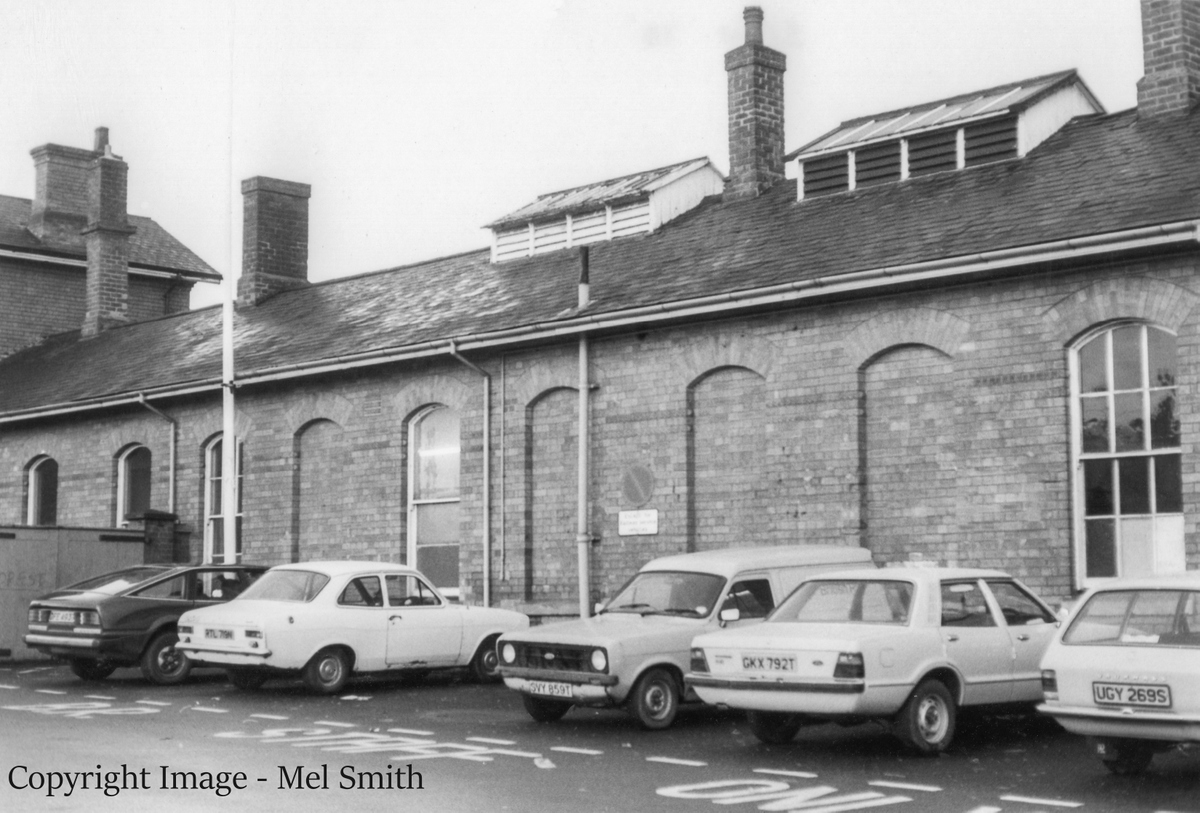 Continuing on along Station Road, this line of single storey buildings link into the main station entrance seen on the left. Copyright Image - Mel Smith