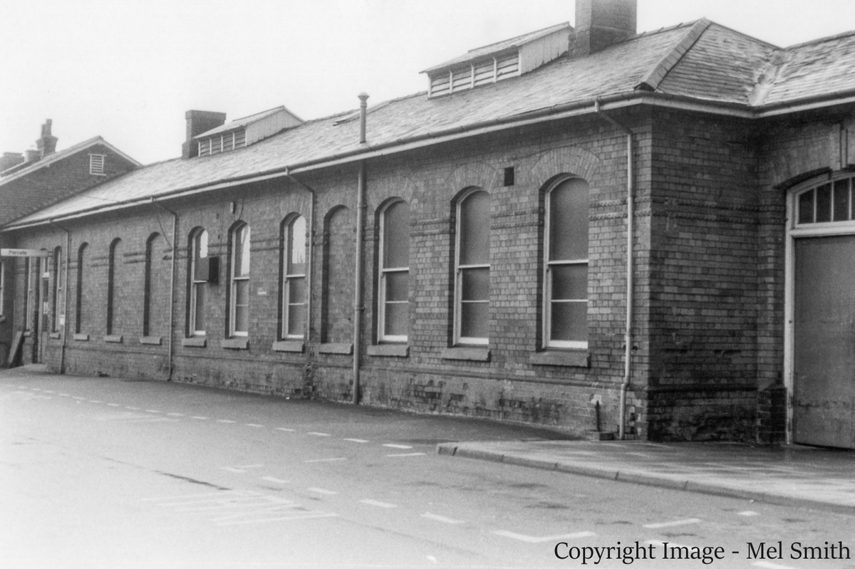 Passing the main entrance we come to the next set of buildings just before entering the Goods Yard which is straight ahead. From right to left the Station Master's Office, the Telegraph Office, a cycle store and the Parcels Office. Copyright Image - Mel Smith