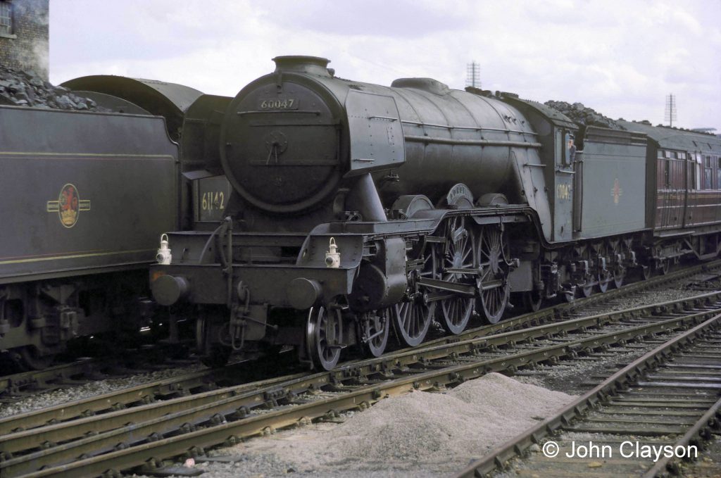 Class A3 locomotive No.60047 Donovan approaching Grantham station from the south on 16th August 1962. The smoke deflectors and 'speedo' mentioned by Roy are evident here. The speedometer drive was taken from the left rear coupled wheel and its flexible connection can be seen curving up to the running plate above. Photograph by Cedric A. Clayson.