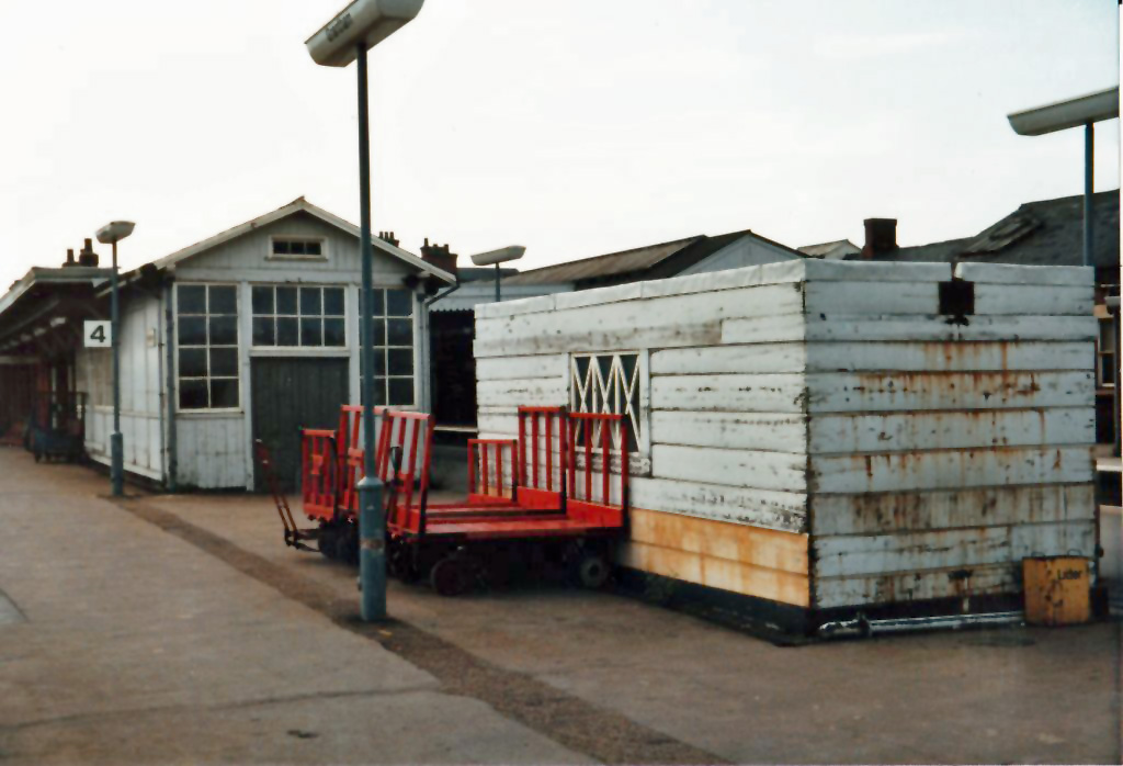 Looking north near the south end of the western platform. The wooden building on the right was used as a secure store for mail by the Post Office. Photograph lent by Roy Vinter.