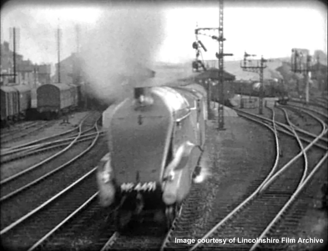 The Coronation thunders towards the box, hauled by No.4491 Commonwealth of Australia. See the unique footage from which this image was taken on the Grantham Looks Back DVD, available from Primetime Video. Taken from a cine film shot by photographer and film maker Walter Lee of Grantham. © Lincolnshire Film Archive