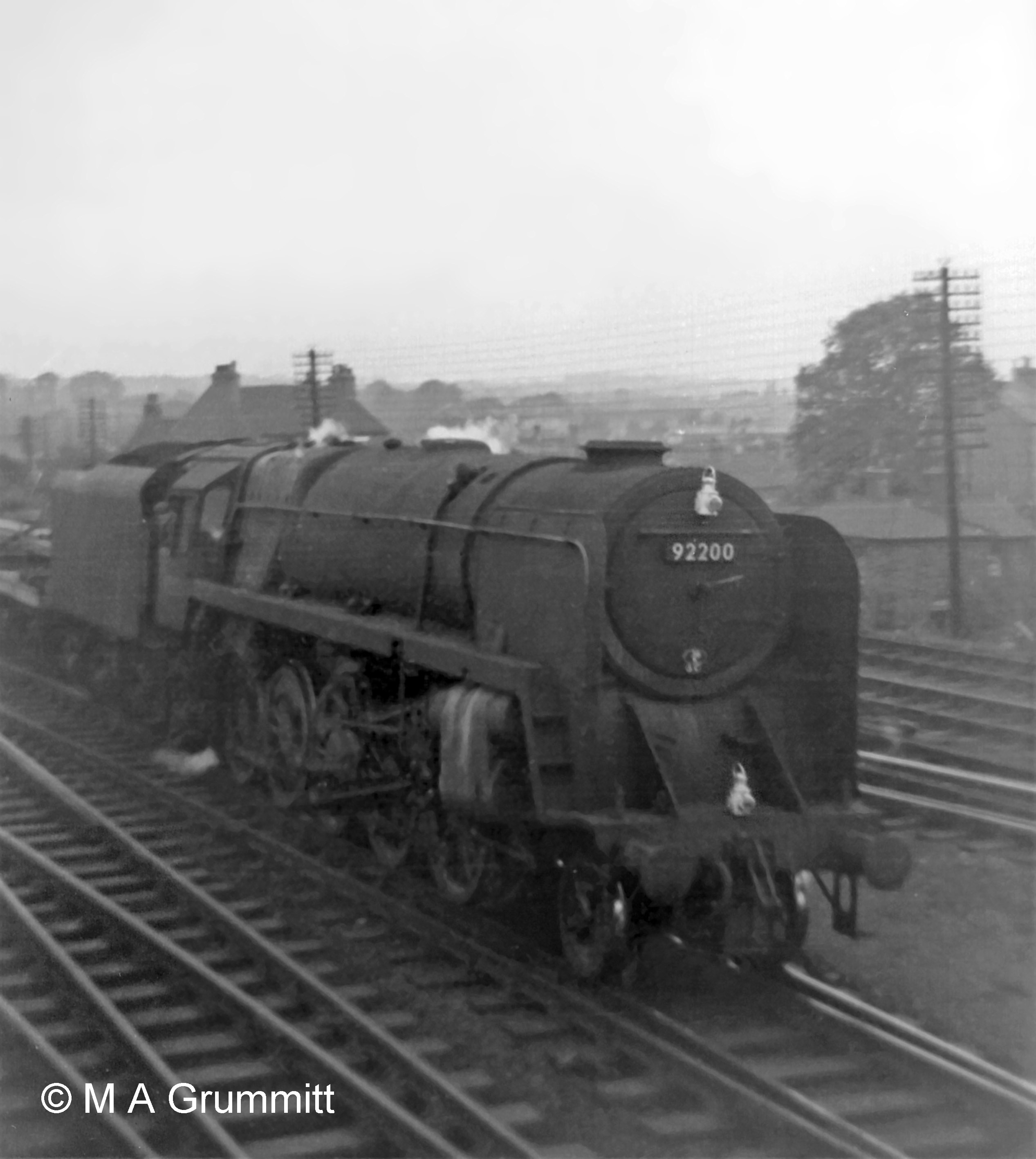 No. 92200 of Doncaster shows a Class H headlamp code for a through freight or ballast train. This locomotive, completed at the end of 1958, was in service for less than seven years. Photograph by Mick Grummitt.