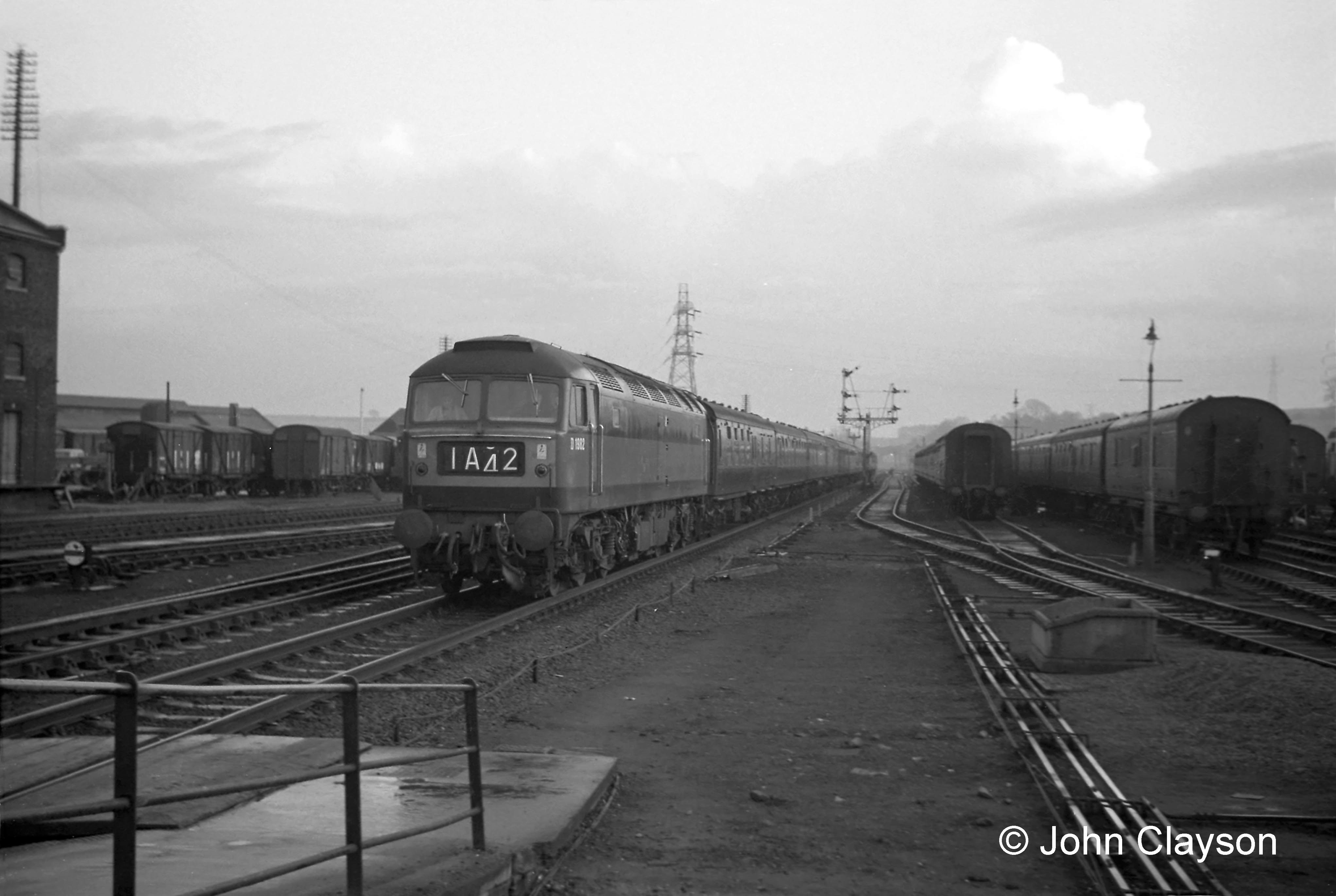 This view of 6th February 1966 shows that, in the area controlled by the Yard Box, all points and crossings have been removed from the Down Main line on which the train is approaching. The Down Slow line, to the train's right, is accessed at Grantham South. No.1 and No.2 carriage sidings still appear to be fully occupied. Train 1A42 was the 3pm departure from King's Cross for Newcastle, hauled on this occasion by Brush Type 4 locomotive No.D1982. Photograph by John Clayson