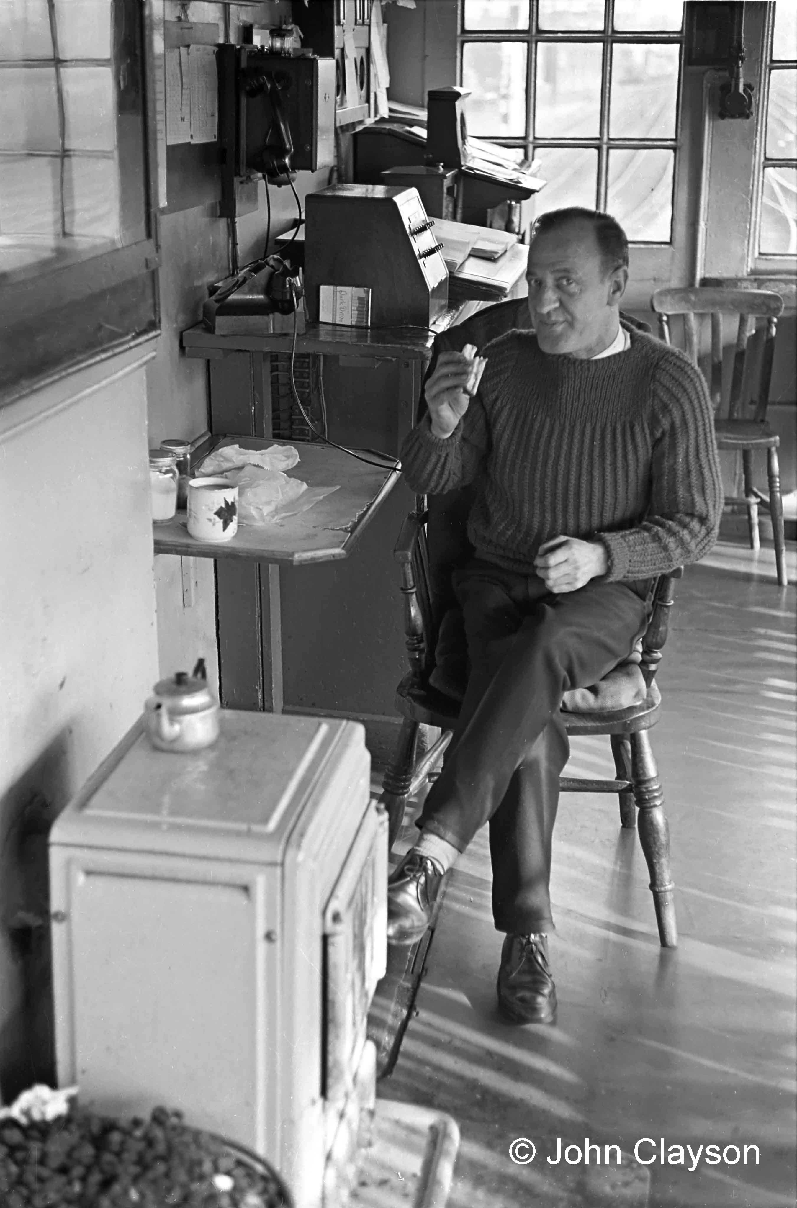 The signalman whose 'afternoon tea' we've interrupted is Jock Drummond. The lever frame is out of shot on the right – the shadows of the levers can be seen across the floor. Photograph taken on 16th April 1964 by Cedric A. Clayson.