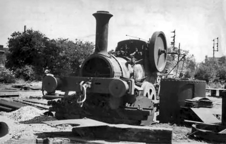 Aveling-Barford's shunting locomotive is seen in a scrapyard off Dysart Road in Grantham, said to be in 1952. Its cylinder block has already been removed. This photograph was published on the Grantham Matters website on January 6th 2013.