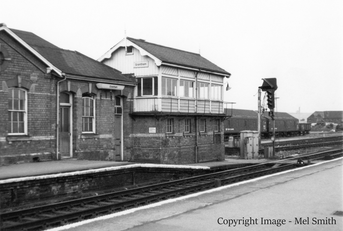 This is Grantham signal box, from which the signals and points in the Grantham area were controlled between February 1972 and February 1980. Built in 1875, it was known as Grantham 'Yard Box' until it closed in June 1971. Its mechanical lever frame was then removed and an electronic control panel was installed so that, in February 1972, it took over the work of the remaining mechanical signal boxes between High Dyke and Barkston on the East Coast Main Line. Its reach extended further north at the end of April. In February 1980 control of signalling in the Grantham area was taken over by Doncaster Power Signal Box and this attractive Victorian structure became redundant. It was demolished late in 1981, after 105 years as a prominent feature at the south end of the station. Copyright Image - Mel Smith 