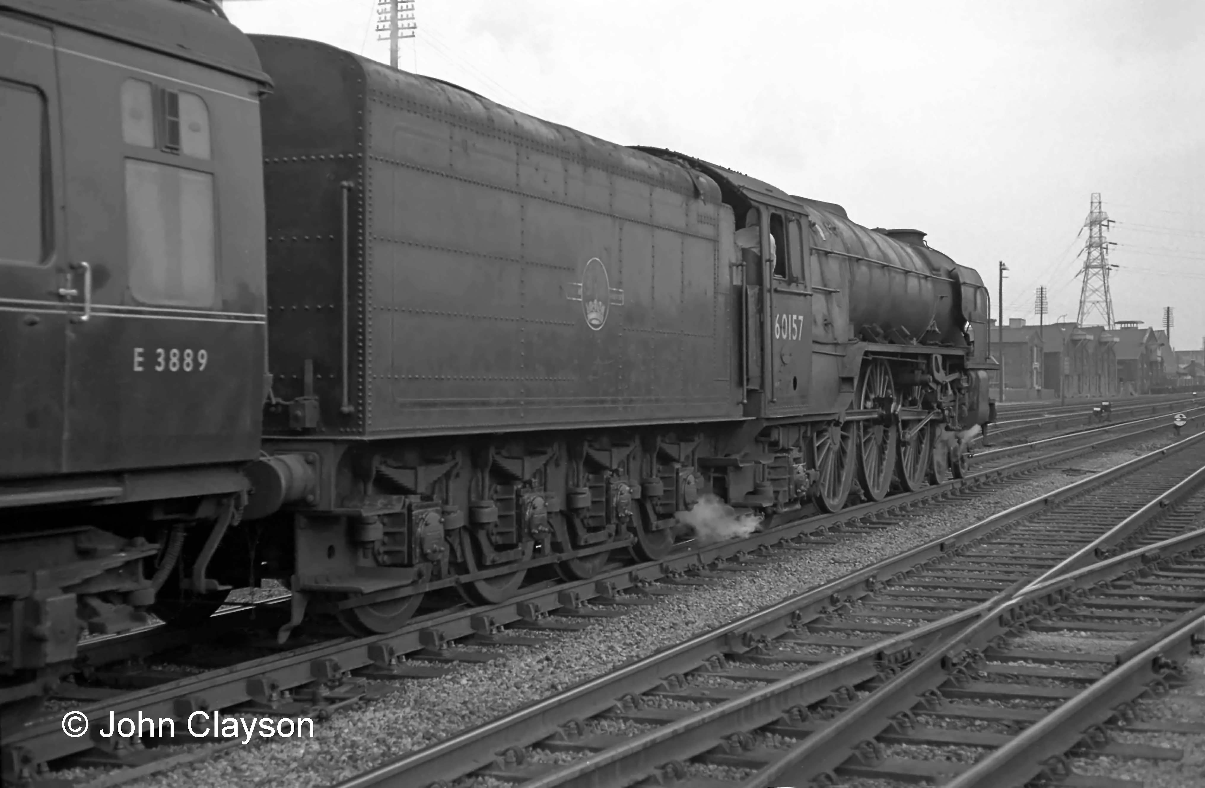 Class A1 No. 60157 Great Eastern departs from Grantham on 9th April 1964. The photograph at the head of the page shows the train's arrival a few minutes earlier. Photograph by Cedric A. Clayson